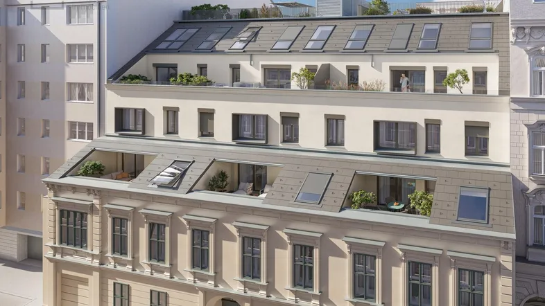 Moderne Gebäudefassade mit mehreren Balkonen und Dachterrassen in einer städtischen Umgebung.