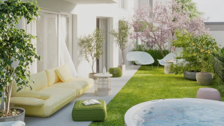 Moderne Gartenterrasse mit bequemen Sitzgelegenheiten, Whirlpool und blühenden Bäumen für entspannte Stunden im Freien.