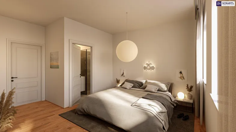 Helles Schlafzimmer mit modernem Design, Holzboden und direktem Zugang zu einem Badezimmer.