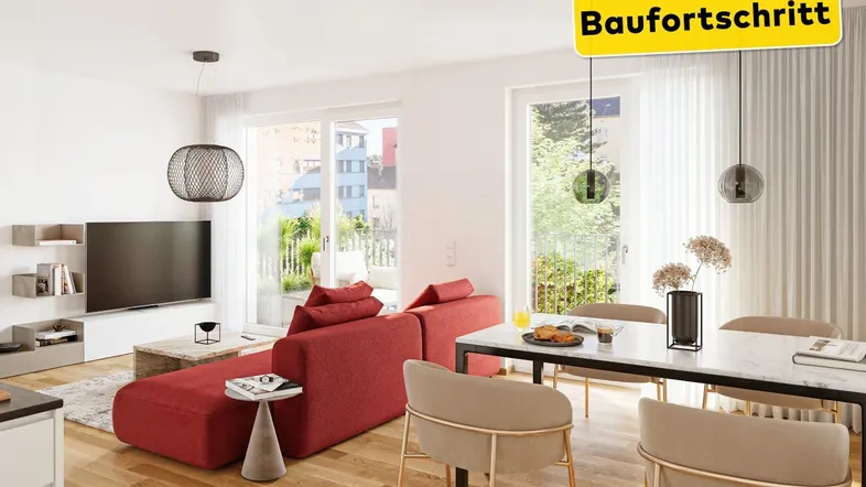 Moderner offener Wohn-Essbereich mit rotem Sofa, Holzboden und Zugang zum Balkon.