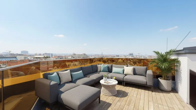 Geräumige Dachterrasse mit bequemen Loungemöbeln und weitem Blick über die Stadt.