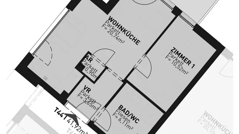 Grundriss einer Wohnung mit Wohnküche, Zimmer, Bad/WC und einem Balkon.