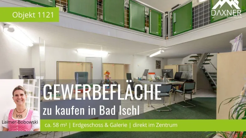Großzügige Gewerbefläche mit offenem Bürobereich und einer Galerieebene, ideal für verschiedene Geschäftsnutzungen.