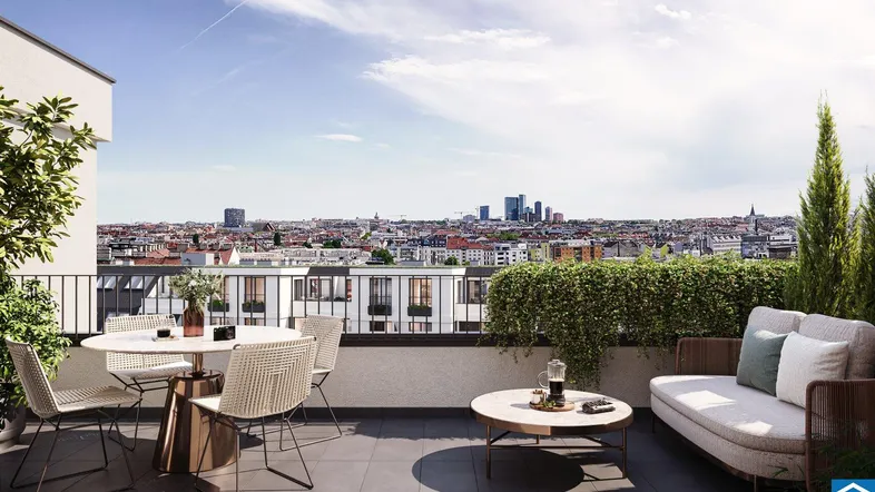 Geräumige Dachterrasse mit modernen Möbeln und weitem Blick über die Stadt.