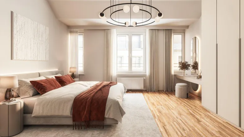 Geräumiges Schlafzimmer mit Holzboden, großem Bett, modernen Leuchten und Schminktisch.