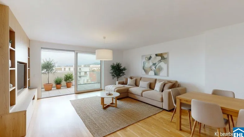 Heller Wohn- und Essbereich mit Holzboden, Zugang zum Balkon und moderner Einrichtung.