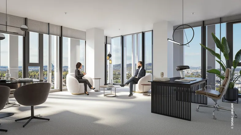 Modernes Büro mit großen Fenstern, die einen weiten Blick auf die Stadt und die Umgebung bieten.