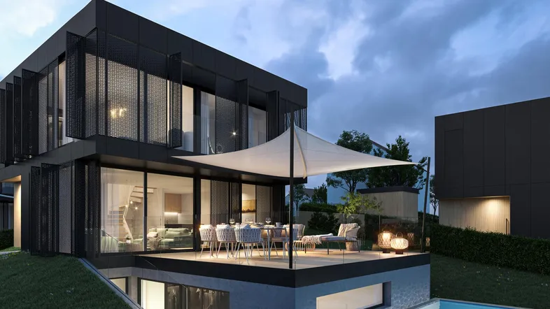 Moderne Villa mit großer Terrasse, Essbereich im Freien und privatem Pool bei Abenddämmerung.