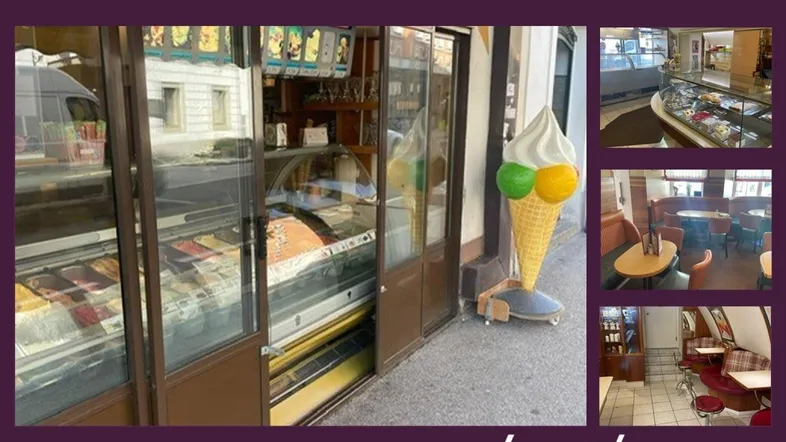 Außenansicht eines Eiscafés mit Schaufenstern und Einblicken in den Verkaufs- und Sitzbereich.