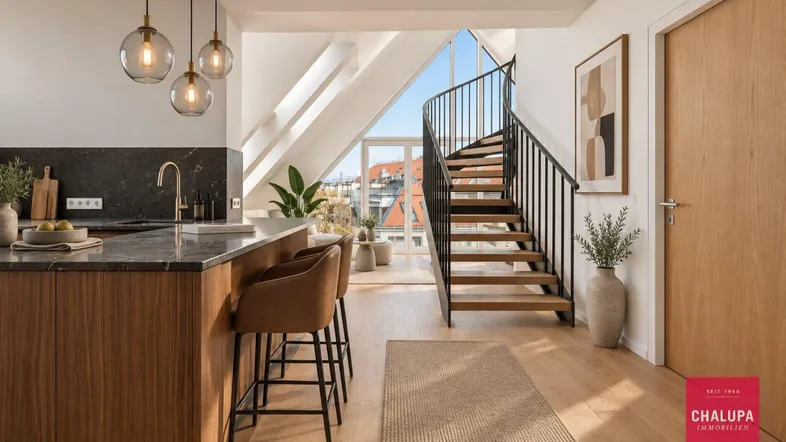 Moderne Küche mit Kücheninsel, Barhockern und eleganter Wendeltreppe in einem hellen Dachgeschoss.
