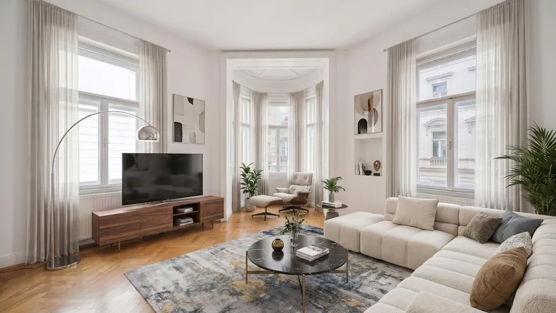 Helles, modern eingerichtetes Wohnzimmer mit Parkettboden, großem Sofa und Erkerfenstern.