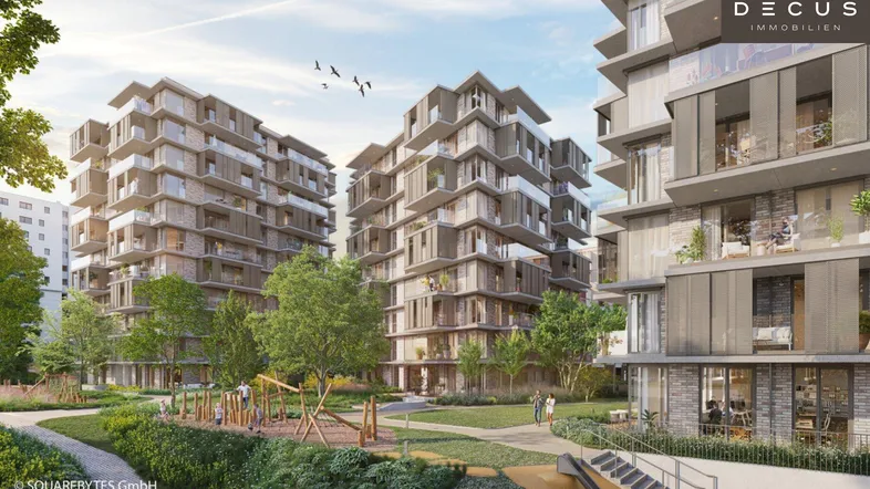 Moderne Wohngebäude mit großen Balkonen und begrünten Außenanlagen inklusive Spielplatz.
