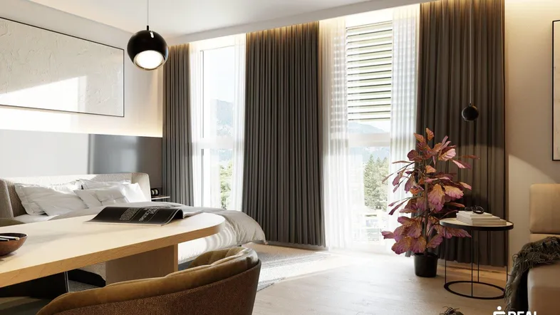 Modernes Schlafzimmer mit großen Fenstern, Holzboden und integriertem Arbeitsbereich.