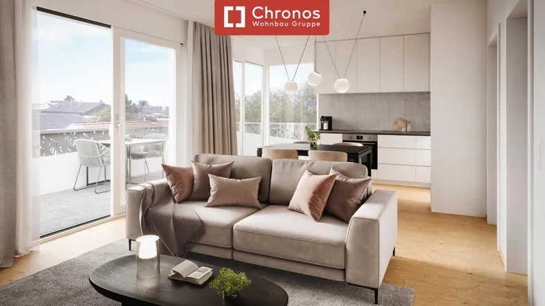 Helles, offenes Wohnzimmer mit integrierter Küche, Holzboden und Zugang zu einem Balkon.