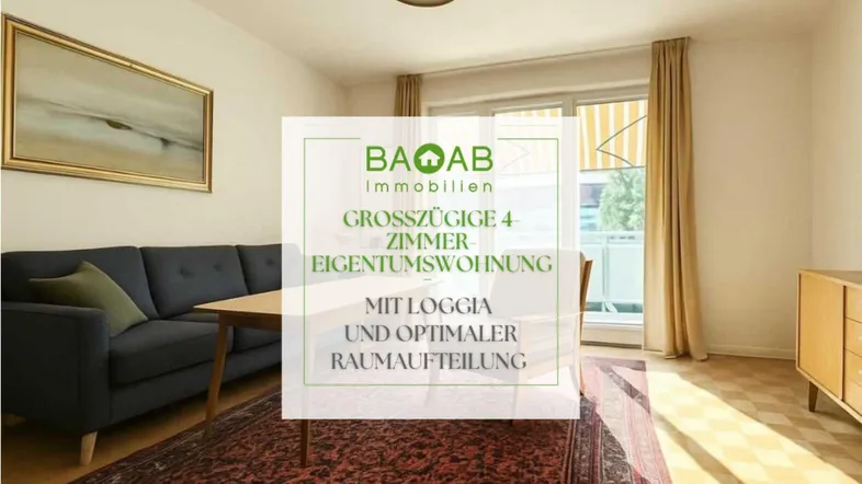 Helles Wohnzimmer mit Sofa, Teppich und Zugang zu einem Balkon oder einer Loggia.