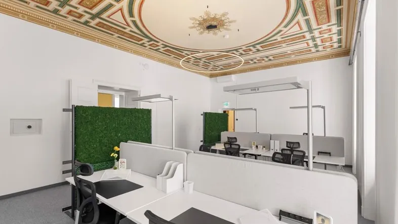 Großes Büro mit mehreren Arbeitsplätzen, grünen Trennwänden und einer kunstvoll bemalten Decke.