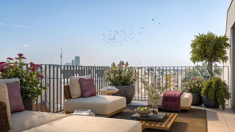 Geräumige Dachterrasse mit bequemen Loungemöbeln, Pflanzen und weitem Stadtblick.