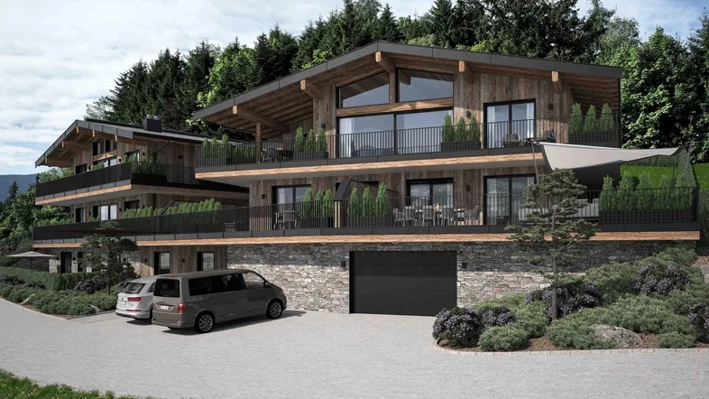Moderne Chalet-Architektur mit Holzfassade, Steinmauern und großzügigen Balkonen in alpiner Umgebung.