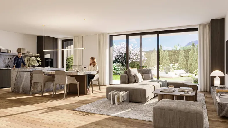 Heller, offener Wohn- und Essbereich mit moderner Küche, Holzboden und Zugang zum Garten.