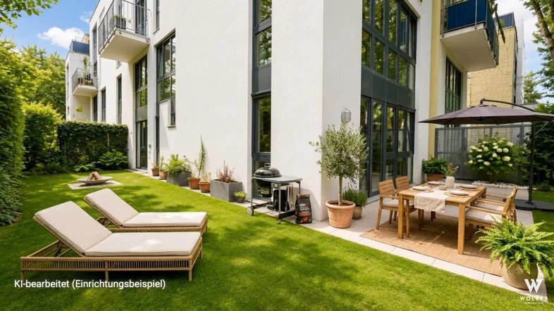 Gepflegter Gartenbereich mit Essplatz im Freien und Liegestühlen vor einem modernen Gebäude.