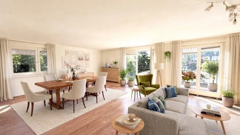 Helles, offen gestaltetes Wohn- und Esszimmer mit Holzboden und Zugang zum Balkon.