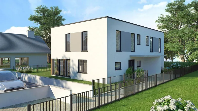 Moderne Doppelhaushälfte mit Zufahrt und Stellplätzen im Grünen.