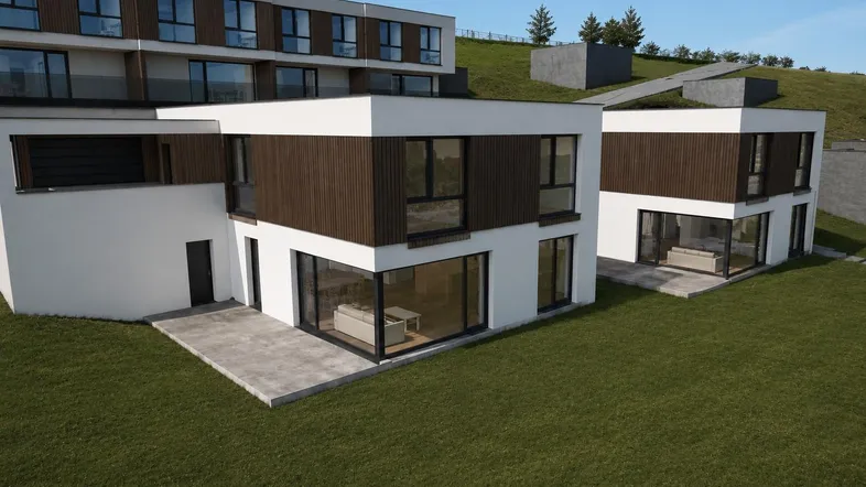 Moderne Architektur mit weißen Fassaden und Holzverkleidung, eingebettet in eine grüne Hügellandschaft.