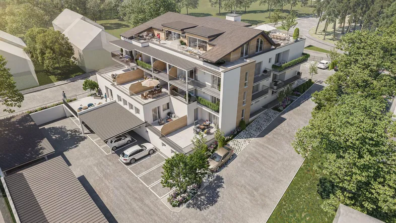 Moderne Wohnanlage mit mehreren Balkonen, Terrassen und einem Carport, umgeben von viel Grün.