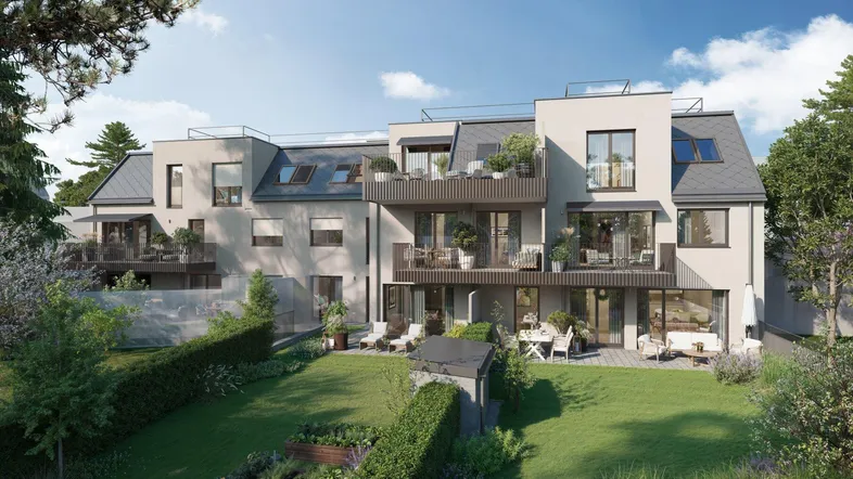 Moderne Wohnanlage mit mehreren Balkonen, Terrassen und gepflegtem Gartenbereich.