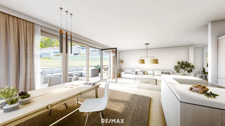 Heller, offener Wohn-Essbereich mit moderner Küche, hohen Decken und direktem Zugang zur Terrasse.