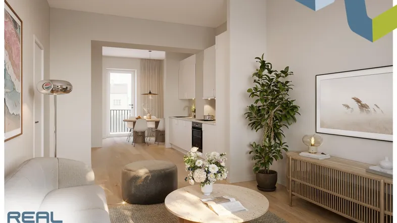Heller offener Wohnbereich mit integrierter Küche, Essbereich und modernem Interieur.