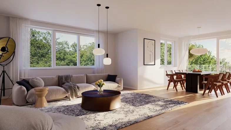 Helles, modernes Wohn-Esszimmer mit großen Fenstern, Holzboden und Blick ins Grüne.