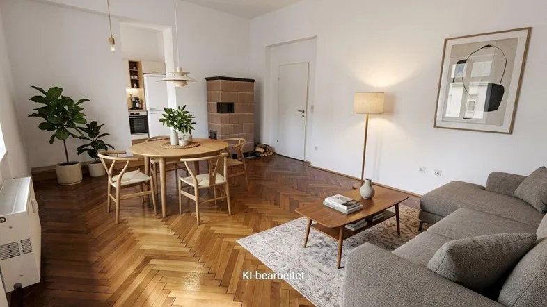 Helles Wohn- und Esszimmer mit Fischgrätparkett, modernem Kachelofen und stilvoller Einrichtung.