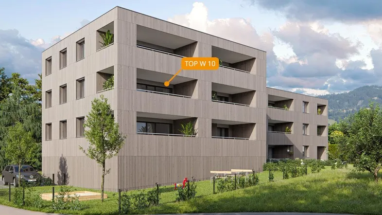 Moderne Wohnanlage mit Holzfassade und Balkonen in grüner Umgebung.
