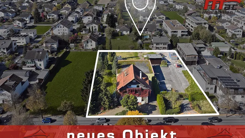 Luftaufnahme des Objekts mit hervorgehobener Grundstücksgrenze und umliegender Wohngegend.
