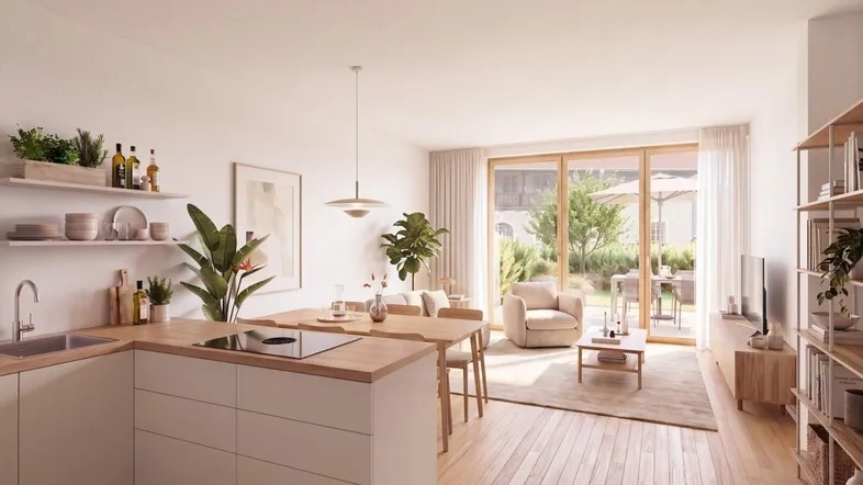Helles, offenes Wohnzimmer mit integrierter Küche, Holzboden und Zugang zur Terrasse mit Gartenblick.