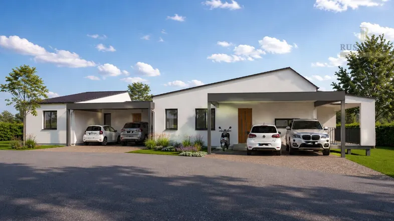 Moderne Einfamilienhäuser mit Carports und gepflegter Außenanlage unter blauem Himmel.