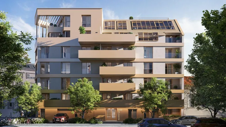 Moderne Wohnanlage mit mehreren Balkonen und Dachterrassen in städtischer Umgebung.