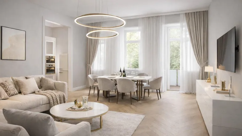 Heller Wohn- und Essbereich mit modernem Design, Parkettboden und Zugang zum Balkon.