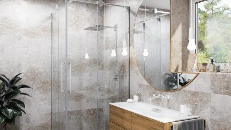 Modernes Badezimmer mit begehbarer Dusche, Holzwaschtisch und großem runden Spiegel.