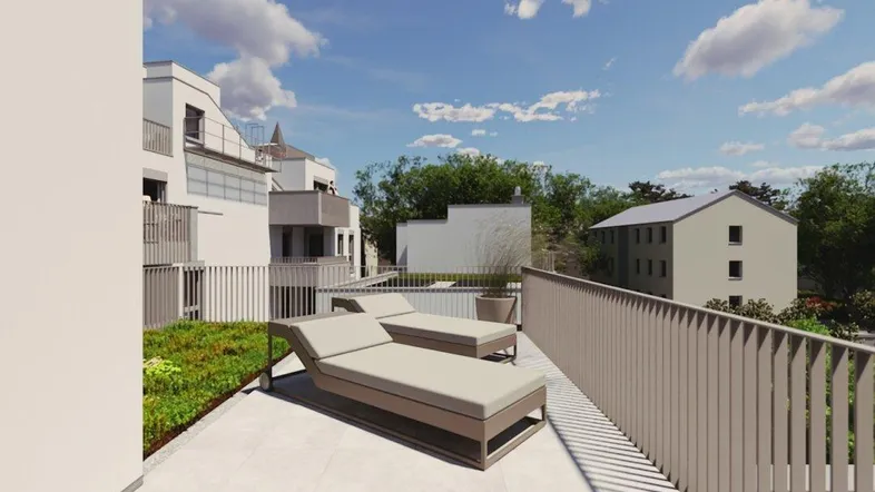 Moderne Dachterrasse mit Liegestühlen und Blick auf die umliegende Wohnbebauung.