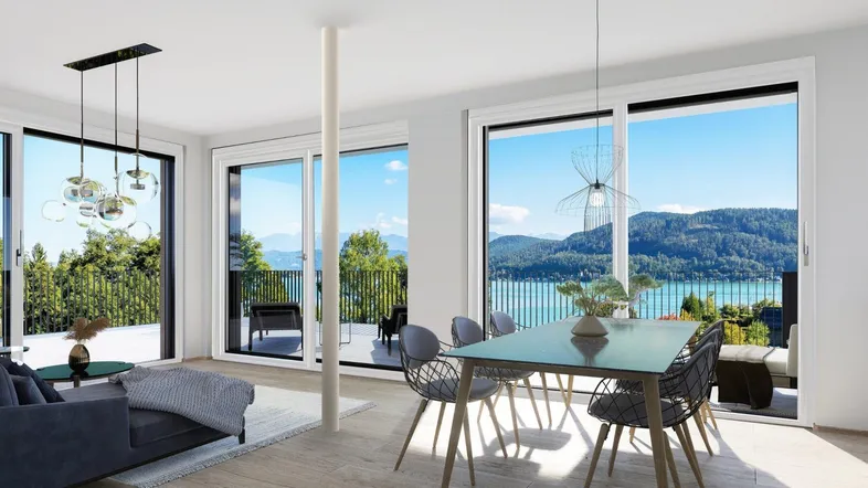 Heller Wohn- und Essbereich mit großen Fenstern, modernem Design und atemberaubendem Seeblick.