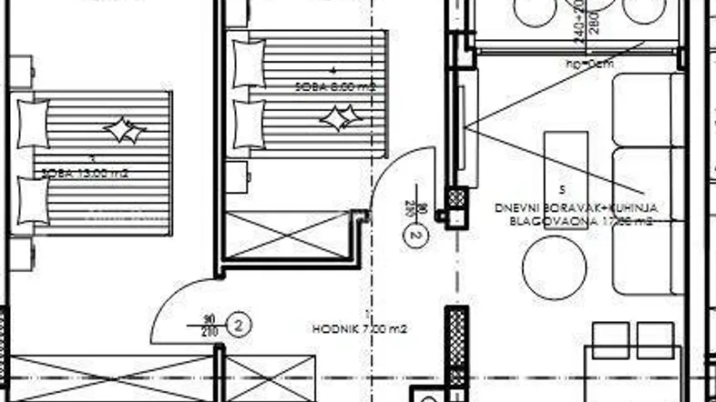 Grundriss einer Wohnung mit zwei Schlafzimmern, einem Bad, offenem Wohnbereich und Loggia.