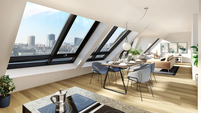 Heller, offener Wohn- und Essbereich mit Dachschrägenfenstern und weitem Stadtblick.