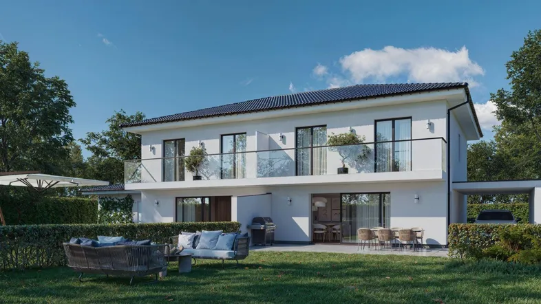 Moderne Doppelhaushälfte mit gepflegtem Garten, Terrasse und Balkonen, ideal für Entspannung im Freien.