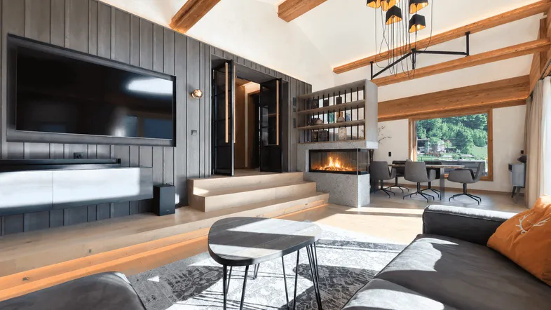 Sunlit Alpine Living Room with Fireplace