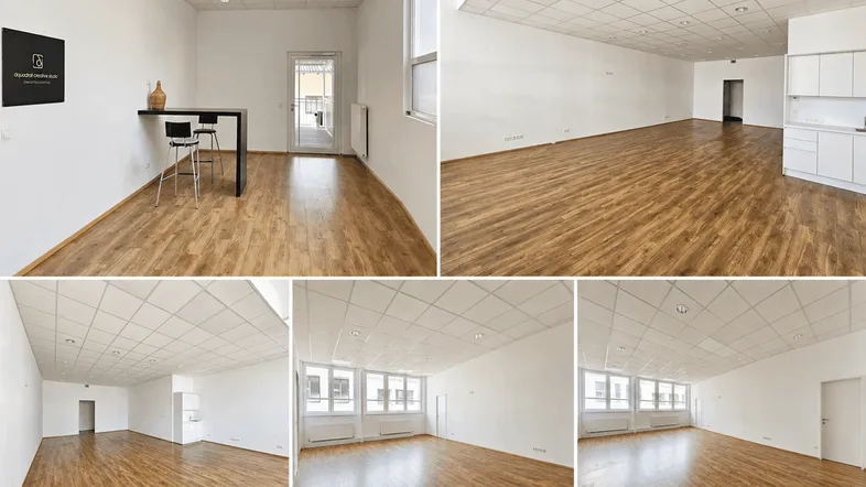 Großzügiger, heller Gewerberaum mit Holzboden, abgehängter Decke und integrierter Küchenzeile.