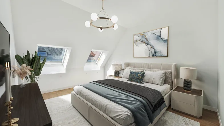 Helles Schlafzimmer mit Dachschrägen, Dachfenstern und modernem Interieur.