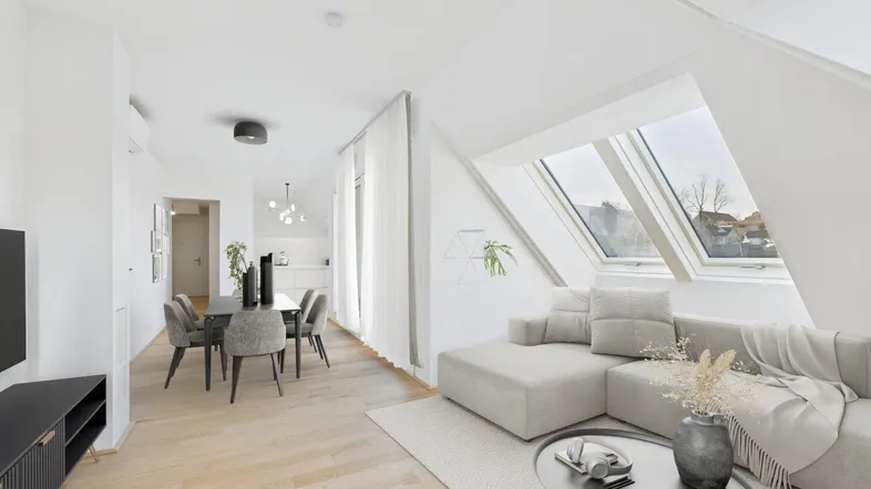 Helles, modern eingerichtetes Wohn-Esszimmer im Dachgeschoss mit Schrägfenstern und Holzboden.