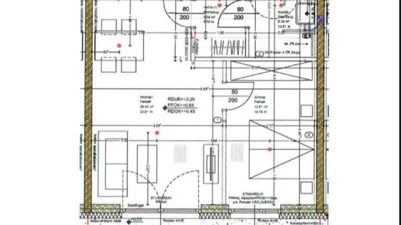 Grundriss einer 2-Zimmer-Wohnung mit offener Küche, Schlafzimmer, Bad und Terrasse.